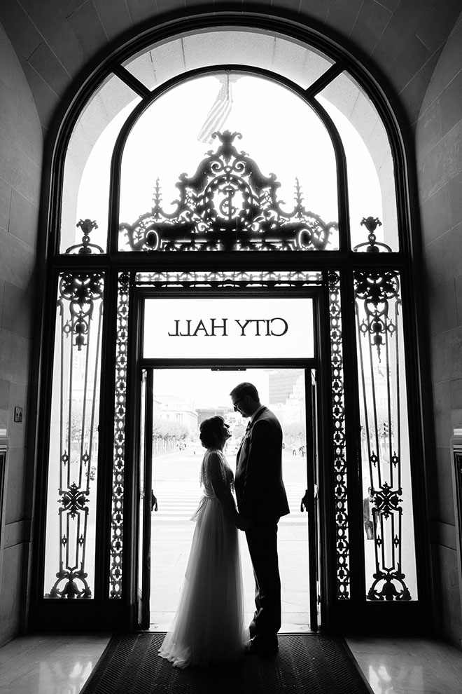 San Francisco wedding
photographer, bride and groom silhouette at San Francisco City Hall