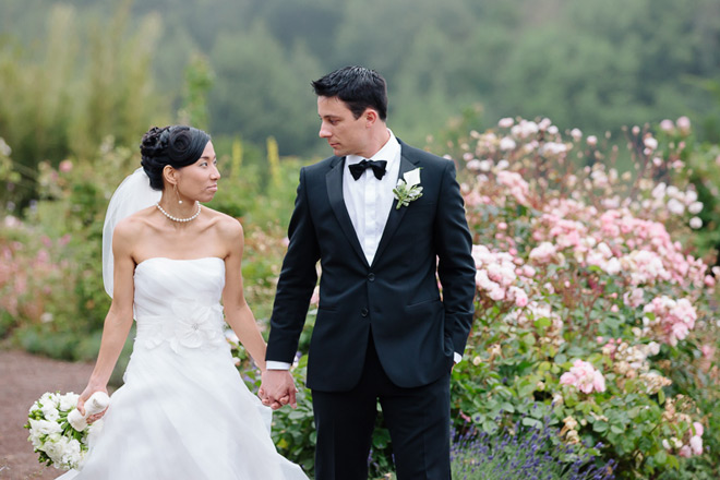 Bride and groom walking after their ceremony at their UC Berkeley Botanical Garden Wedding