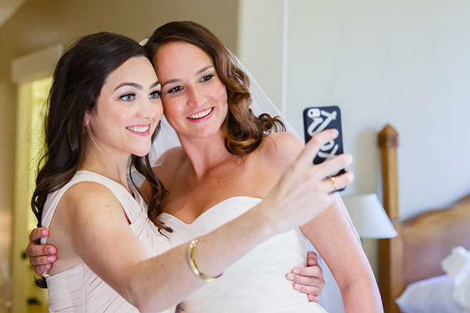 Bride and bridemaid taking a selfie