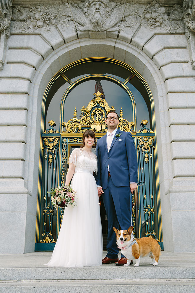 San Francisco wedding
photographer, bride and groom with their dog on the steps of San Francisco City Hall