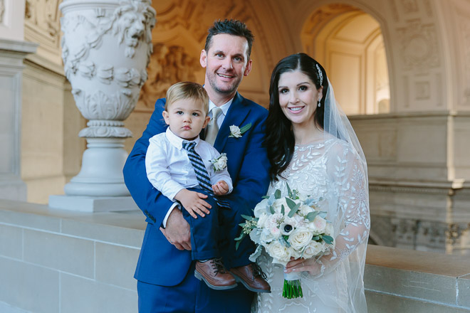 San Francisco wedding
photographer, bride and groom with their son at their San Francisco City Hall wedding