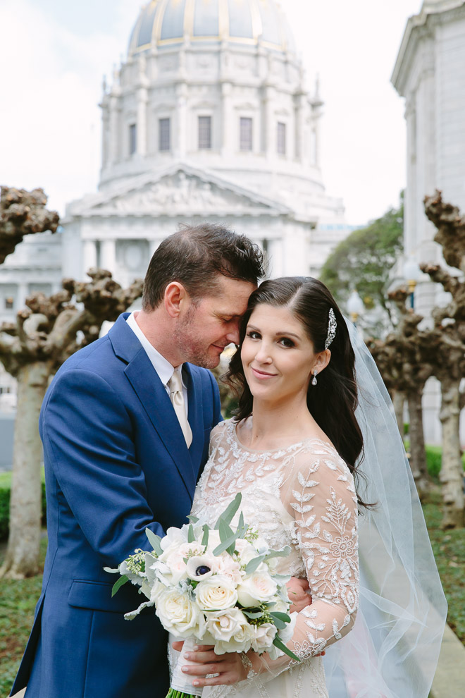 San Francisco wedding
photographer, bride and groom at their San Francisco City Hall wedding