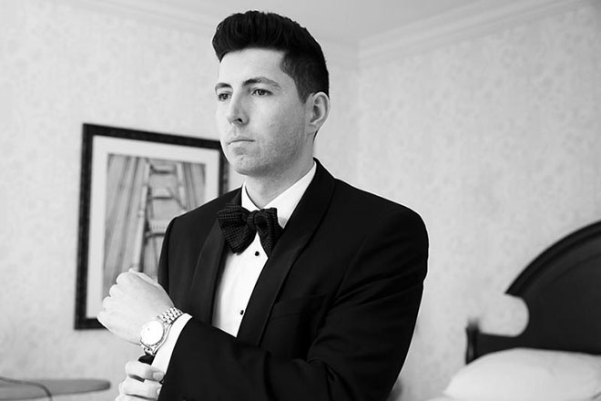 groom getting ready at the Omni Hotel in San Francisco